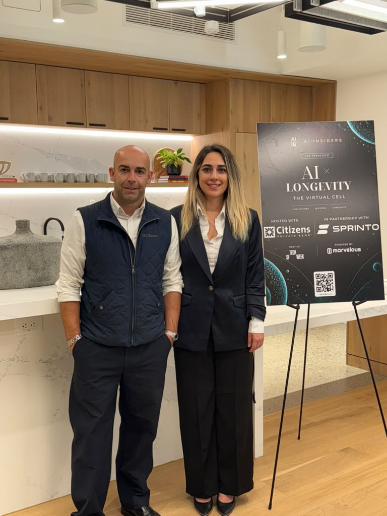 Guests at the AI × Longevity welcome sign, hosted with Citizens Private Bank